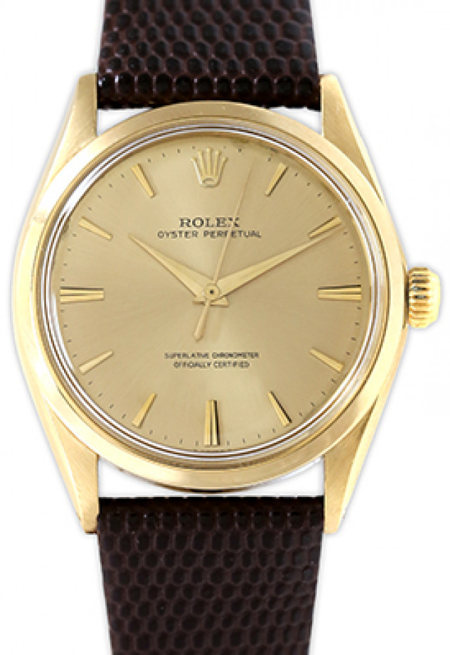 Rolex 1002 Yellow Gold on Strap, Fluted Bezel Champagne with Gold Index